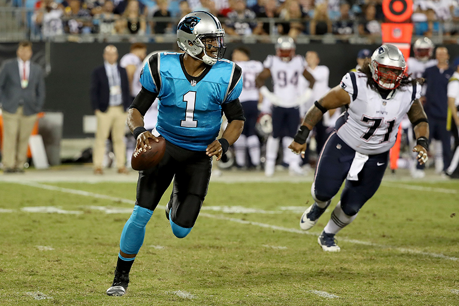 CHARLOTTE, NC - AUGUST 24: Cam Newton #1 of the Carolina Panthers runs the ball against the New England Patriots in the second quarter during their game at Bank of America Stadium on August 24, 2018 in Charlotte, North Carolina. (Photo by Streeter Lecka/Getty Images)