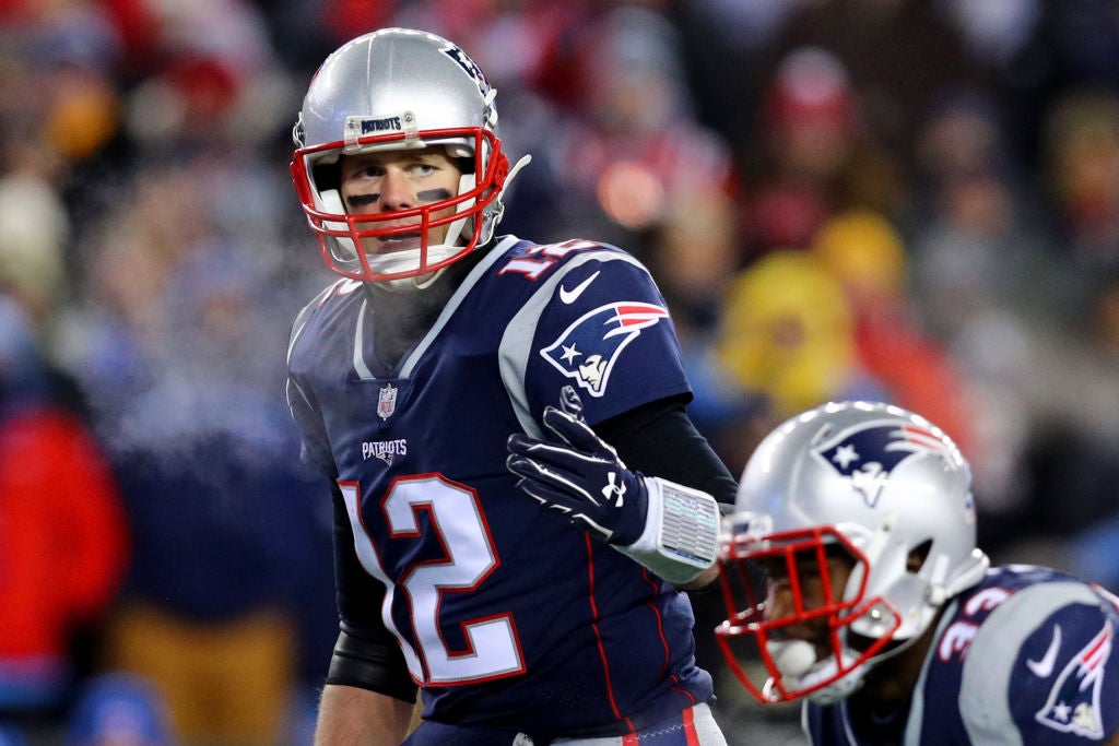 Tom Brady motions to the Patriots offense against the Tennessee Titans in the 2017 AFC DIvisional Playoff game, (Photo by Maddie Meyer/Getty Images)