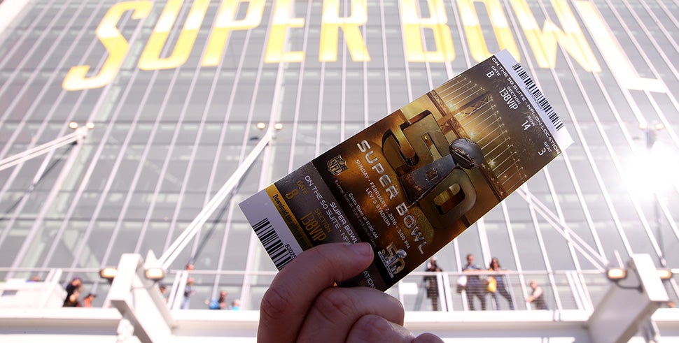 SANTA CLARA, CA - FEBRUARY 07: A fan holds up a ticket to Super Bowl 50 outside Levi's Stadium on February 7, 2016 in Santa Clara, California. (Photo by Andy Lyons/Getty Images)