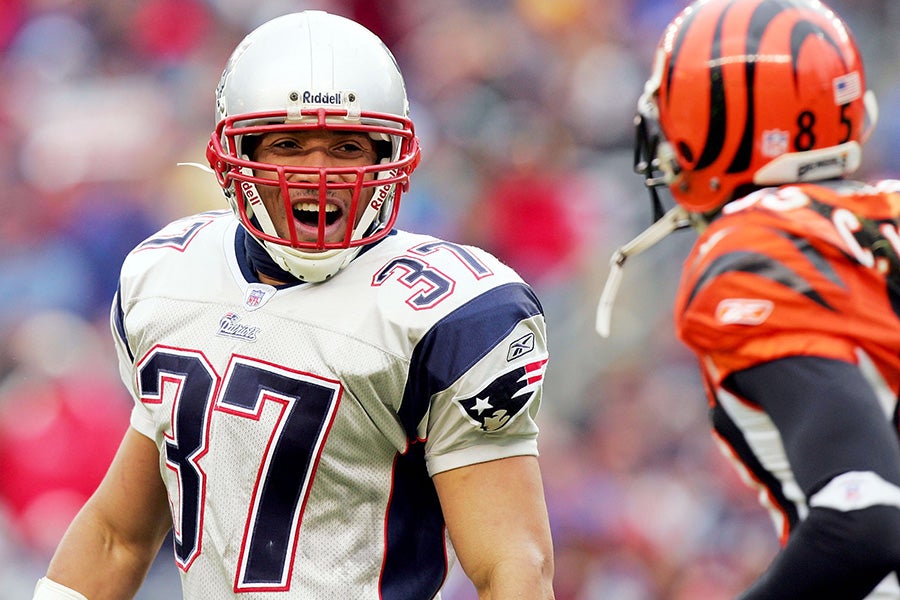 Rodney Harrison of the New England Patriots talks to Chad Johnson of the Cincinnati Bengals after Johnson was unable to catch a ball in the end zone at Gillette Stadium on December 12, 2004 in Foxboro, Massachusetts. The Patriots won 35-28. (Photo by Ezra Shaw/Getty Images)