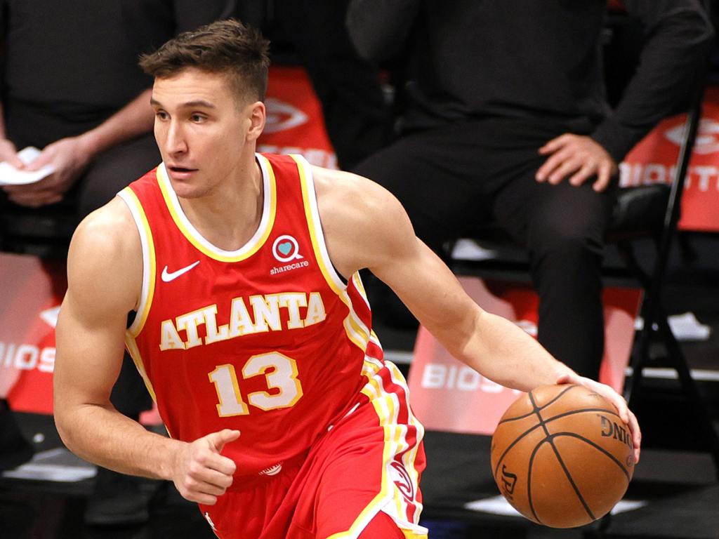 NEW YORK, NEW YORK - JANUARY 01: Bogdan Bogdanovic #13 of the Atlanta Hawks dribbles during the second half against the Brooklyn Nets at Barclays Center on January 01, 2021 in the Brooklyn borough of New York City. The Hawks won 114-96. NOTE TO USER: User expressly acknowledges and agrees that, by downloading and/or using this Photograph, user is consenting to the terms and conditions of the Getty Images License Agreement. (Photo by Sarah Stier/Getty Images)