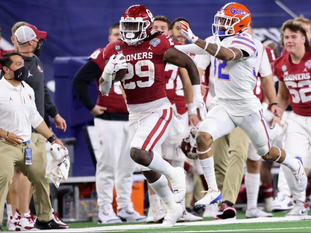 ARLINGTON, TEXAS - DECEMBER 30: Running back Rhamondre Stevenson #29 of the Oklahoma Sooners runs against the Florida Gators during the third quarter at AT&T Stadium on December 30, 2020 in Arlington, Texas. (Photo by Ronald Martinez/Getty Images)