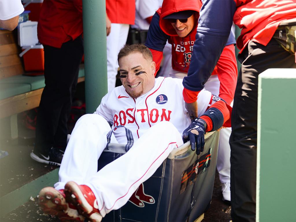 Christian Vazquez #7 of the Boston Red Sox takes a ride in the laundry cart after hitting a solo home run in the seventh inning against the Minnesota Twins at Fenway Park on April 18, 2022 in Boston, Massachusetts. (Photo by Kathryn Riley/Getty Images)