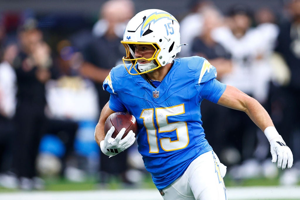 INGLEWOOD, CALIFORNIA - OCTOBER 27: Ladd McConkey #15 of the Los Angeles Chargers runs after the catch in the third quarter of a game against the New Orleans Saints at SoFi Stadium on October 27, 2024 in Inglewood, California. (Photo by Ronald Martinez/Getty Images)