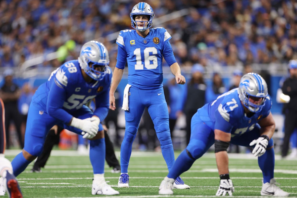 DETROIT, MICHIGAN - NOVEMBER 28: Quarterback Jared Goff #16 of the Detroit Lions looks on from the line of scrimmage during the second quarter against the Chicago Bears at Ford Field on November 28, 2024 in Detroit, Michigan. (Photo by Mike Mulholland/Getty Images)