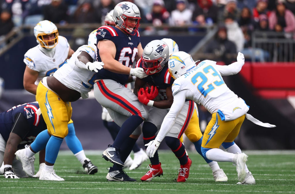 FOXBOROUGH, MASSACHUSETTS - DECEMBER 28: Rhamondre Stevenson #38 of the New England Patriots carries the ball during the first quarter against the Los Angeles Chargers at Gillette Stadium on December 28, 2024 in Foxborough, Massachusetts. (Photo by Maddie Meyer/Getty Images)