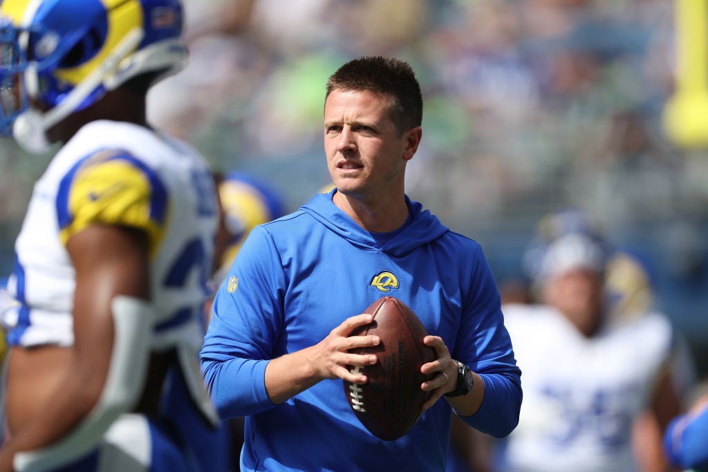 SEATTLE, WASHINGTON - SEPTEMBER 10:  Offensive coordinator Mike LaFleur of the Los Angeles Rams works with the team during warmups prior to the game against the Seattle Seahawks at Lumen Field on September 10, 2023 in Seattle, Washington. (Photo by Steph Chambers/Getty Images)