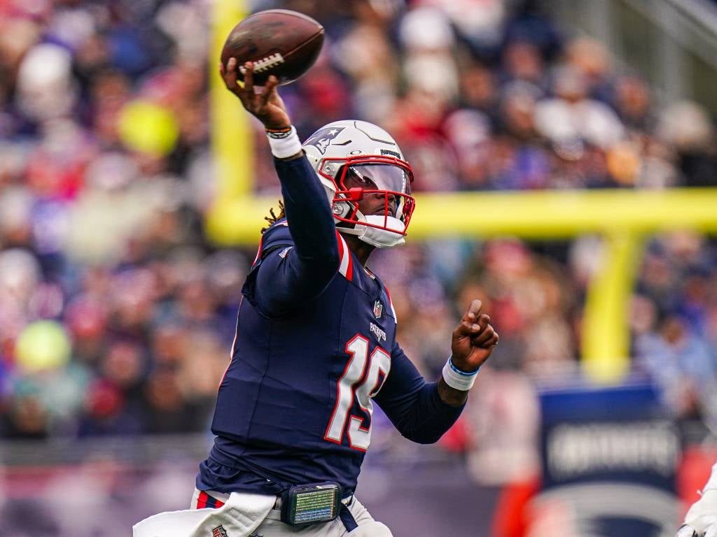 Jan 5, 2025; Foxborough, Massachusetts, USA; New England Patriots quarterback Joe Milton III (19) throws a pass against the Buffalo Bills in the first half at Gillette Stadium. Mandatory Credit: David Butler II-Imagn Images