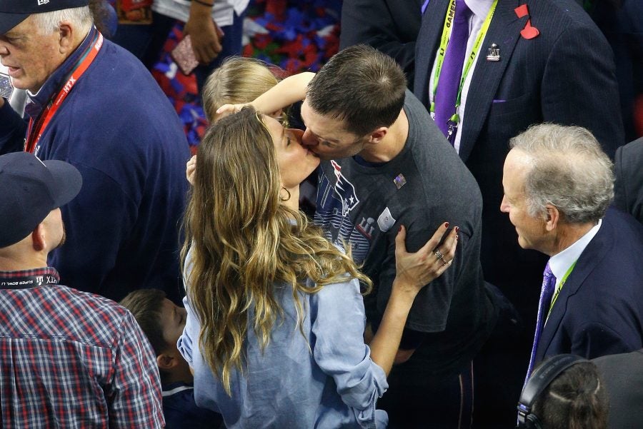 HOUSTON, TX - Gisele Bündchen and Tom Brady #12 of the New England Patriots celebrate after defeating the Atlanta Falcons 34-28 in overtime during Super Bowl 51 at NRG Stadium on February 5, 2017 in Houston, Texas. (Photo by Bob Levey/Getty Images)