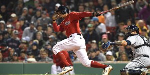 Apr 27, 2018, Boston, MA, USA: Boston Red Sox shortstop Xander Bogaerts hits a single during the fifth inning against the Tampa Bay Rays at Fenway Park. (Photo Credit: Bob DeChiara-USA TODAY Sports)