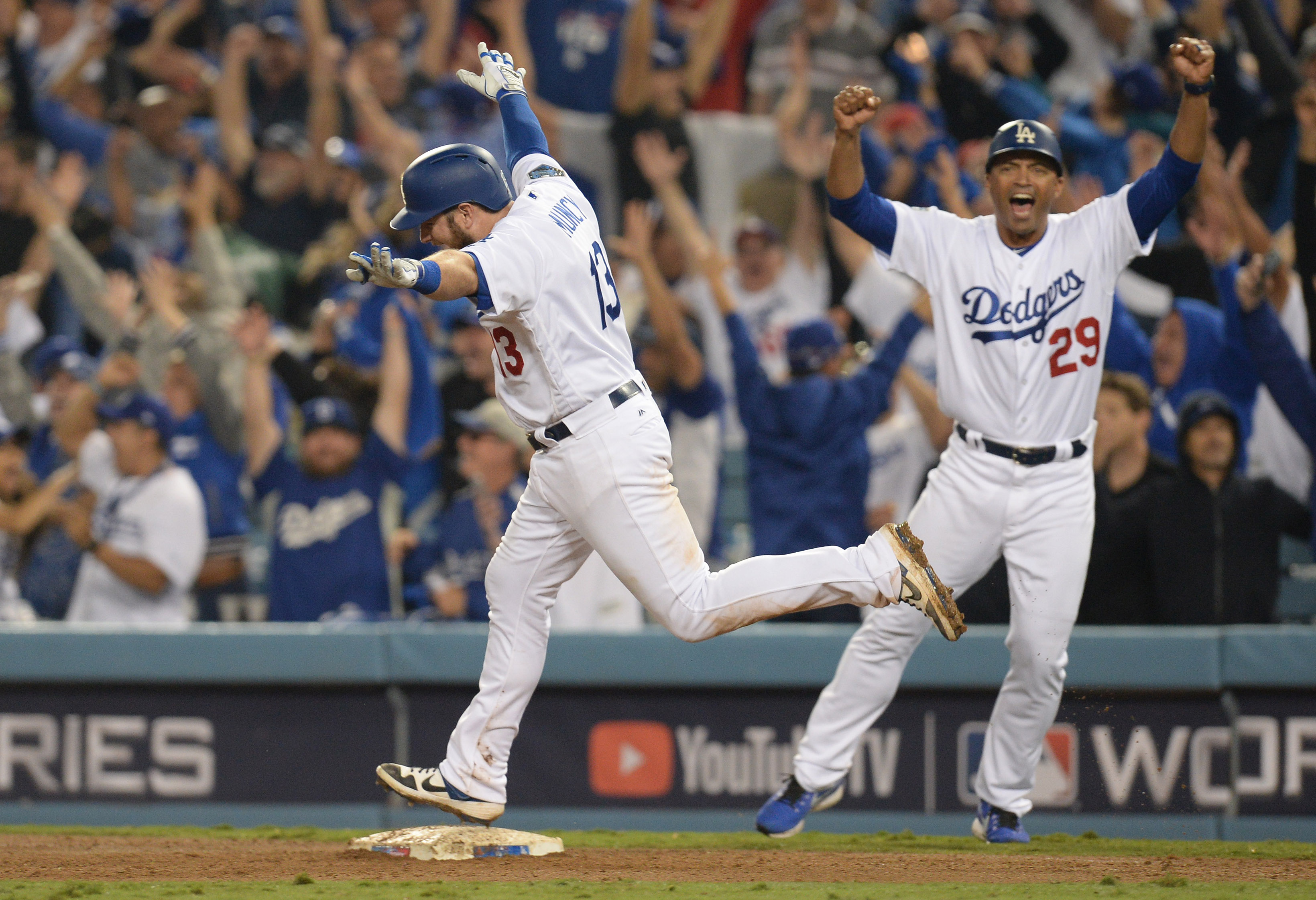 Red Sox reliever Nathan Eovaldi throws a strike to Dodgers Yasiel