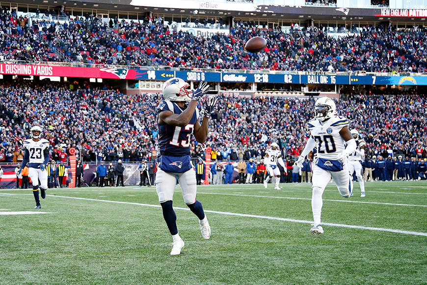 Jan 13, 2019; Foxborough, MA, USA; New England Patriots wide receiver Phillip Dorsett (13) catches a pass for a touchdown in front of Los Angeles Chargers defensive back Desmond King (20) during the second quarter in an AFC Divisional playoff football game at Gillette Stadium. Mandatory Credit: Winslow Townson-USA TODAY Sports