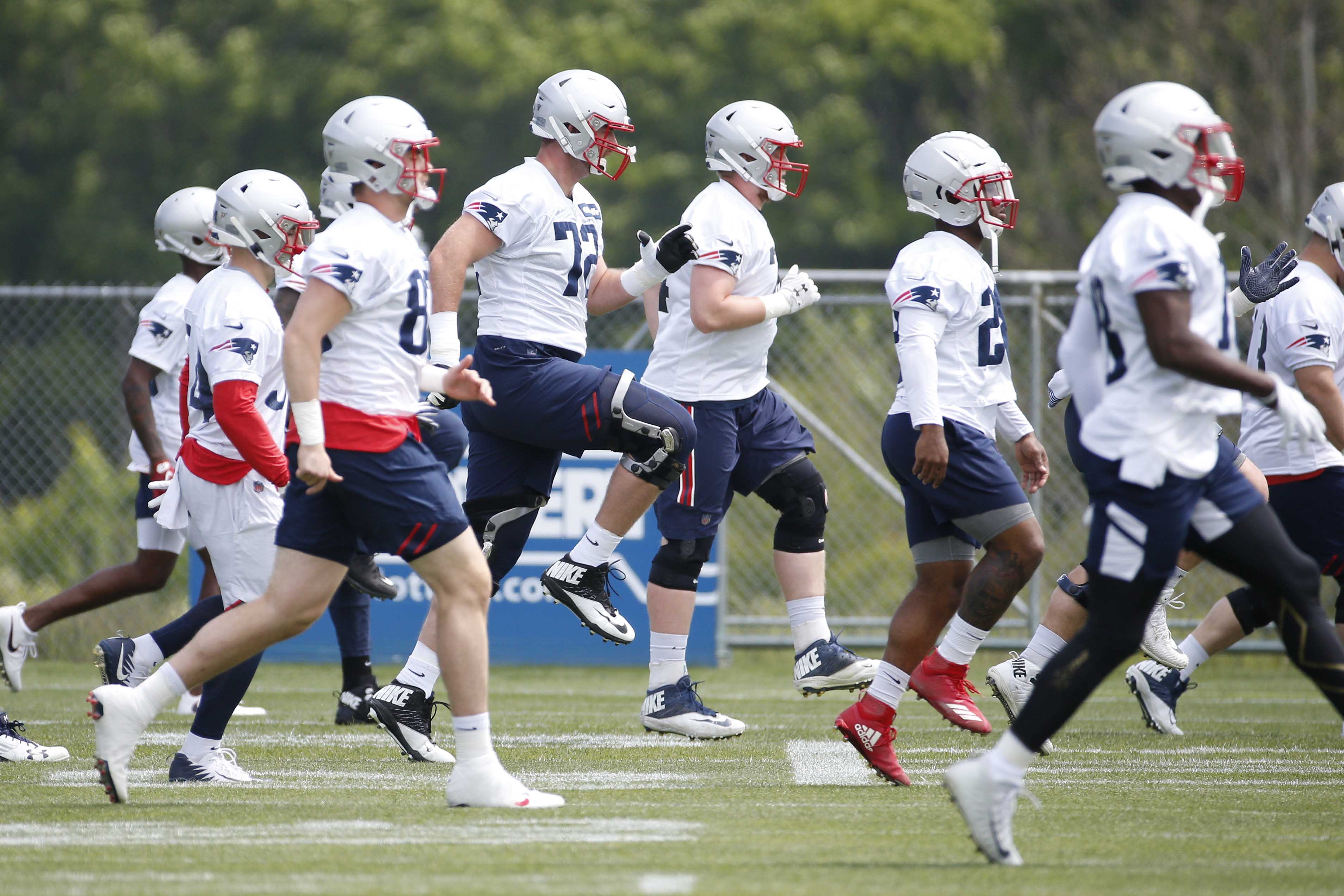 Jun 5, 2019; Foxborough, MA, USA; New England Patriots tackle Dan Skipper (72) works out with other players during mandatory minicamp at the Gillette Stadium practice field. Mandatory Credit: Greg M. Cooper-USA TODAY Sports