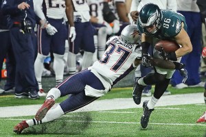 Jordan Richards of the New England Patriots hits Zach Ertz of the Philadelphia Eagles during Super Bowl Lll at U.S. Bank Stadium on February 4, 2018 in Minneapolis, Minnesota. The Eagles defeated the Patriots 41-33. (Photo by Jonathan Daniel/Getty Images)