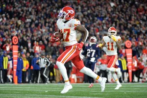 Mecole Hardman of the Kansas City Chiefs runs on his way to scoring a 48-yard receiving touchdown during the second quarter against the New England Patriots in the game at Gillette Stadium on December 08, 2019 in Foxborough, Massachusetts. (Photo by Kathryn Riley/Getty Images)