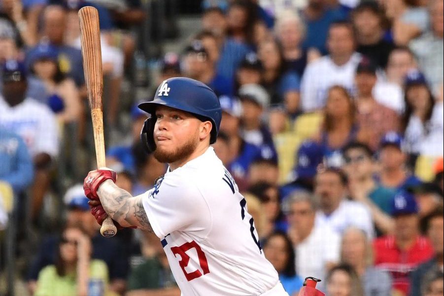 Aug 3, 2019; Los Angeles, CA, USA; Los Angeles Dodgers center fielder Alex Verdugo (27) hits a sacrifice fly to score catcher Will Smith (16) in the fifth inning of the game against the San Diego Padres at Dodger Stadium. Mandatory Credit: Jayne Kamin-Oncea-USA TODAY Sports