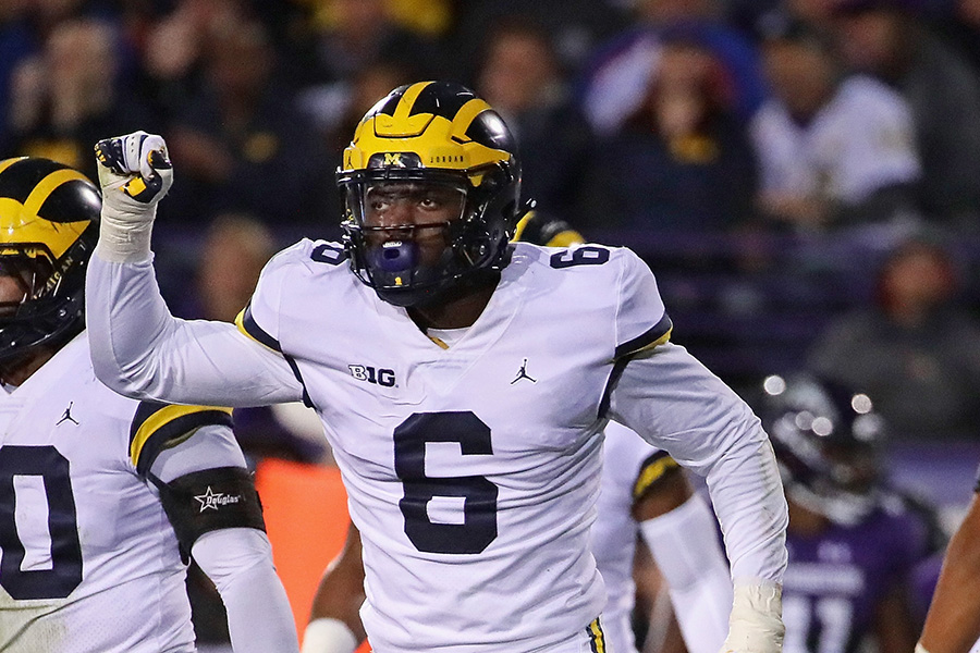 EVANSTON, IL - SEPTEMBER 29: Josh Uche #6 of the Michigan Wolverines celebrates a sack against Clayton Thorson #18 of the Northwestern Wildcats at Ryan Field on September 29, 2018 in Evanston, Illinois. Michigan defeated Northwestern 20-17. (Photo by Jonathan Daniel/Getty Images)