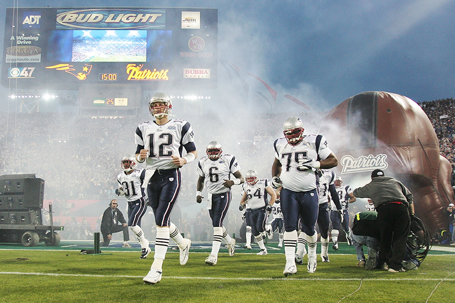 JACKSONVILLE, FLORIDA - FEBRUARY 06: Quarterback Tom Brady #12 of the New England Patriots leads his team onto the field before the start of Super Bowl XXXIX against the Philadelphia Eagles at Alltel Stadium on February 6, 2005 in Jacksonville, Florida. (Photo by Jed Jacobsohn/Getty Images)