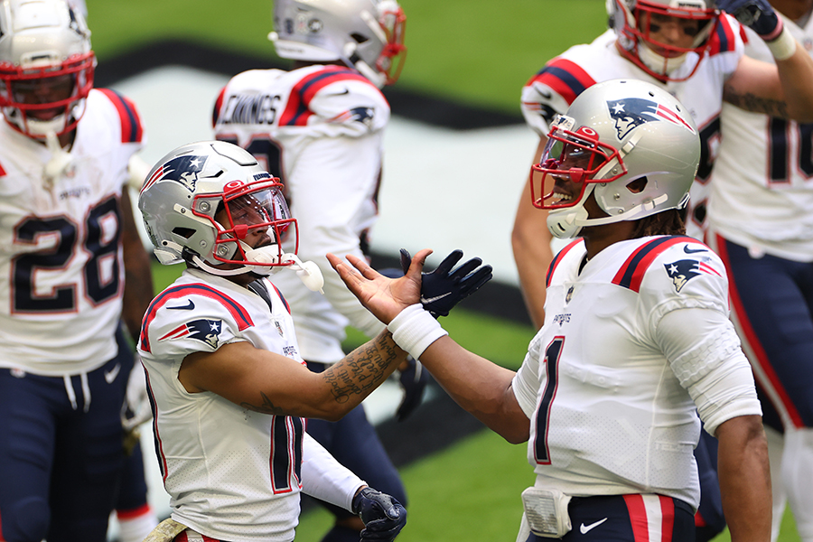 The Patriots' offensive snap counts against the Texans illustrate how heavily they leaned on the passing game. (Photo by Carmen Mandato/Getty Images)