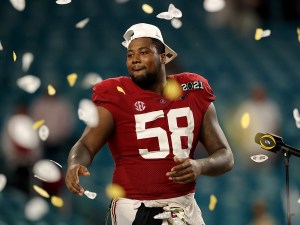 MIAMI GARDENS, FLORIDA - JANUARY 11: Christian Barmore #58 of the Alabama Crimson Tide celebrates after defeating the Ohio State Buckeyes 52-24 in the College Football Playoff National Championship game at Hard Rock Stadium on January 11, 2021 in Miami Gardens, Florida. (Photo by Kevin C. Cox/Getty Images)