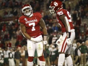 Dec 5, 2020; Norman, Oklahoma, USA; Oklahoma Sooners defensive lineman Isaiah Thomas (95) and defensive end Ronnie Perkins (7) react during the first half against the Baylor Bears at Gaylord Family-Oklahoma Memorial Stadium. Mandatory Credit: Kevin Jairaj-USA TODAY Sports