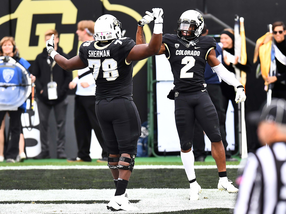 Oct 6, 2018; Boulder, CO, USA; Colorado Buffaloes wide receiver Laviska Shenault Jr. (2) celebrates his touchdown with offensive lineman William Sherman (78) in the second quarter against the Arizona State Sun Devils at Folsom Field. Mandatory Credit: Ron Chenoy-USA TODAY Sports