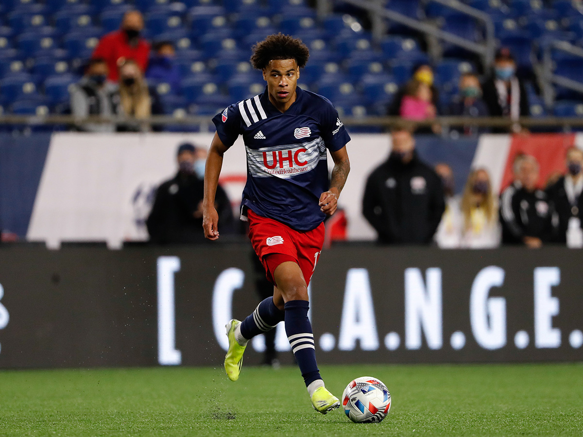 New England Revolution Tajon Buchanan tracked by European giant