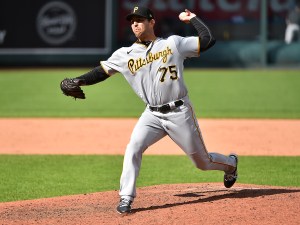 KANSAS CITY, MISSOURI - SEPTEMBER 13: Relief pitcher Austin Davis #75 of the Pittsburgh Pirates throws in the eighth inning against the Kansas City Royals at Kauffman Stadium on September 13, 2020 in Kansas City, Missouri. (Photo by Ed Zurga/Getty Images)