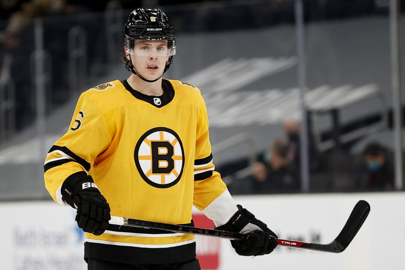 BOSTON, MASSACHUSETTS - APRIL 15: Mike Reilly #6 of the Boston Bruins looks on during the third period against the New York Islanders at TD Garden on April 15, 2021 in Boston, Massachusetts. The Bruins defeat the Islanders 4-1. (Photo by Maddie Meyer/Getty Images)