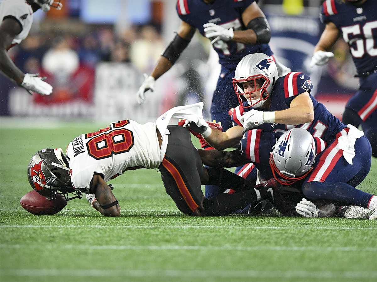 Oct 3, 2021; Foxboro, MA, USA; Tampa Bay Buccaneers wide receiver Jaydon Mickens (85) fumbles the ball on a punt during the second half against the New England Patriots at Gillette Stadium. The fumble call is reversed because of penalty on New England. Mandatory Credit: Brian Fluharty-USA TODAY Sports