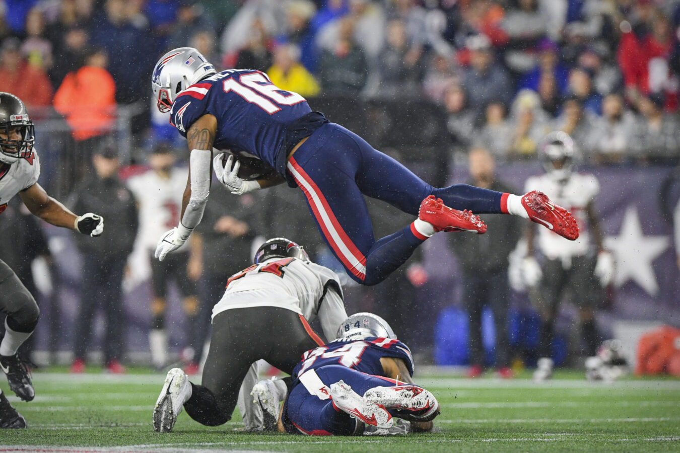 Oct 3, 2021; Foxboro, MA, USA; New England Patriots wide receiver Jakobi Meyers (16) dives with the ball against the Tampa Bay Buccaneers during the first quarter at Gillette Stadium. Mandatory Credit: Brian Fluharty-USA TODAY Sports