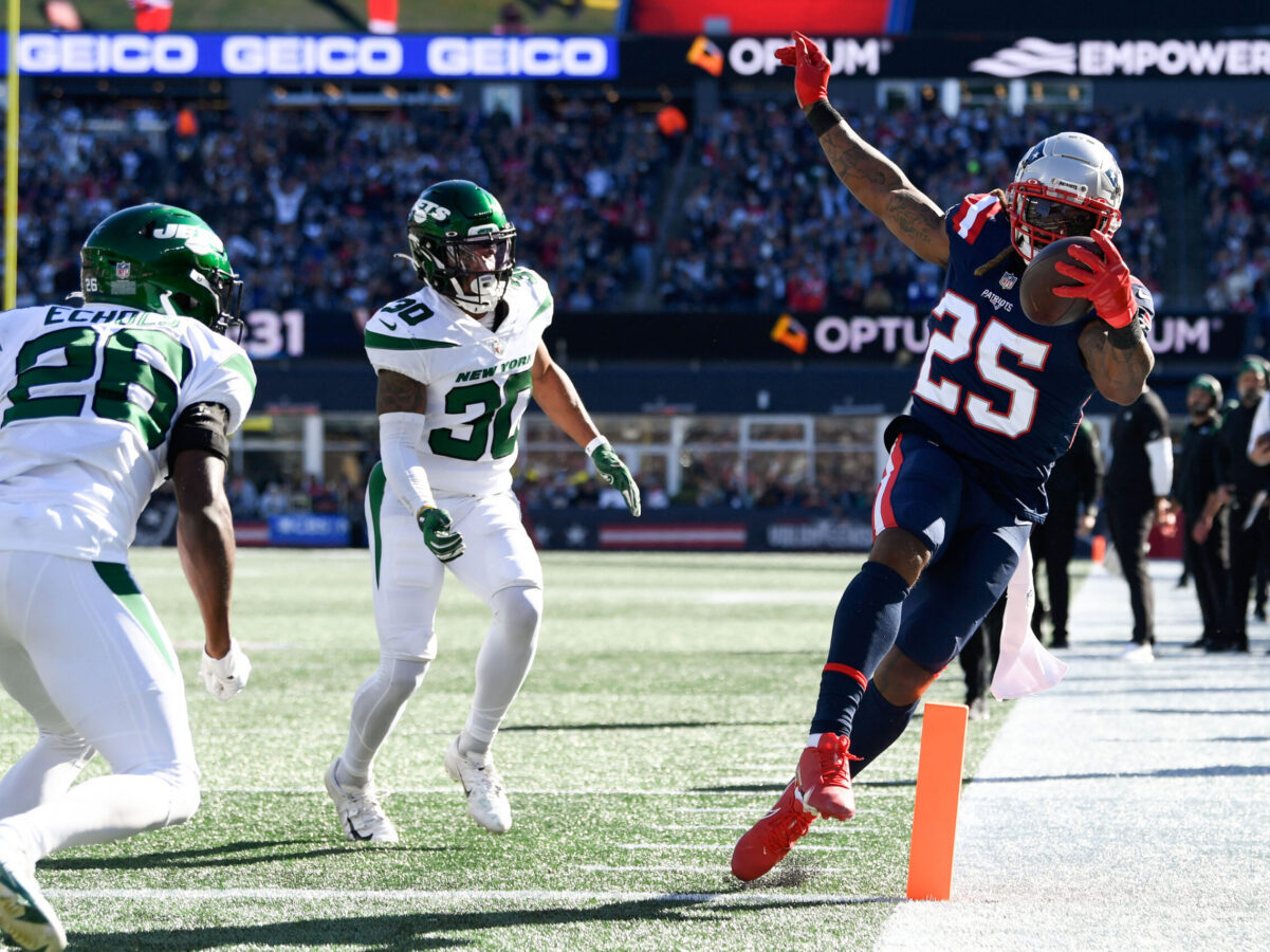 Oct 24, 2021; Foxborough, Massachusetts, USA;  New England Patriots running back Brandon Bolden (25) scores a touchdown against the New York Jets during the first half at Gillette Stadium. Mandatory Credit: Brian Fluharty-USA TODAY Sports