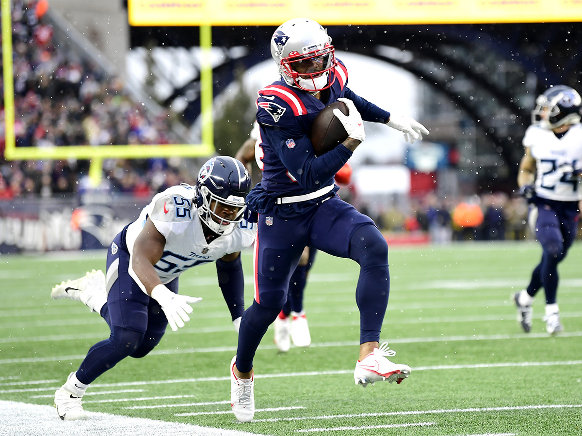 FOXBOROUGH, MASSACHUSETTS - NOVEMBER 28: Kendrick Bourne #84 of the New England Patriots runs after the catch for a third quarter touchdown against the Tennessee Titans at Gillette Stadium on November 28, 2021 in Foxborough, Massachusetts. (Photo by Billie Weiss/Getty Images)