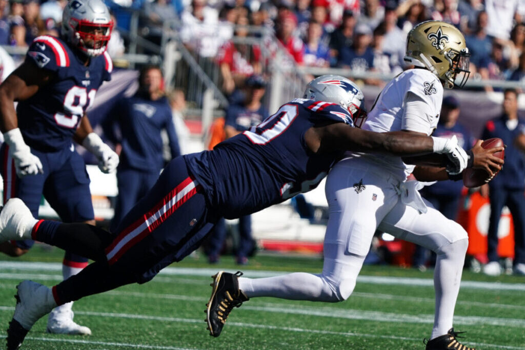 Sep 26, 2021; Foxborough, Massachusetts, USA; New Orleans Saints quarterback Jameis Winston (2) is sacked by New England Patriots defensive tackle Christian Barmore (90) during the second half at Gillette Stadium. Mandatory Credit: David Butler II-USA TODAY Sports