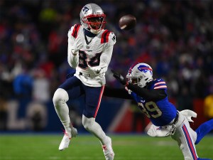 Jan 15, 2022; Orchard Park, New York, USA; New England Patriots wide receiver Kendrick Bourne (84) makes a catch against Buffalo Bills cornerback Levi Wallace (39) in the first quarter of the AFC Wild Card playoff game at Highmark Stadium. Mandatory Credit: Rich Barnes-USA TODAY Sports