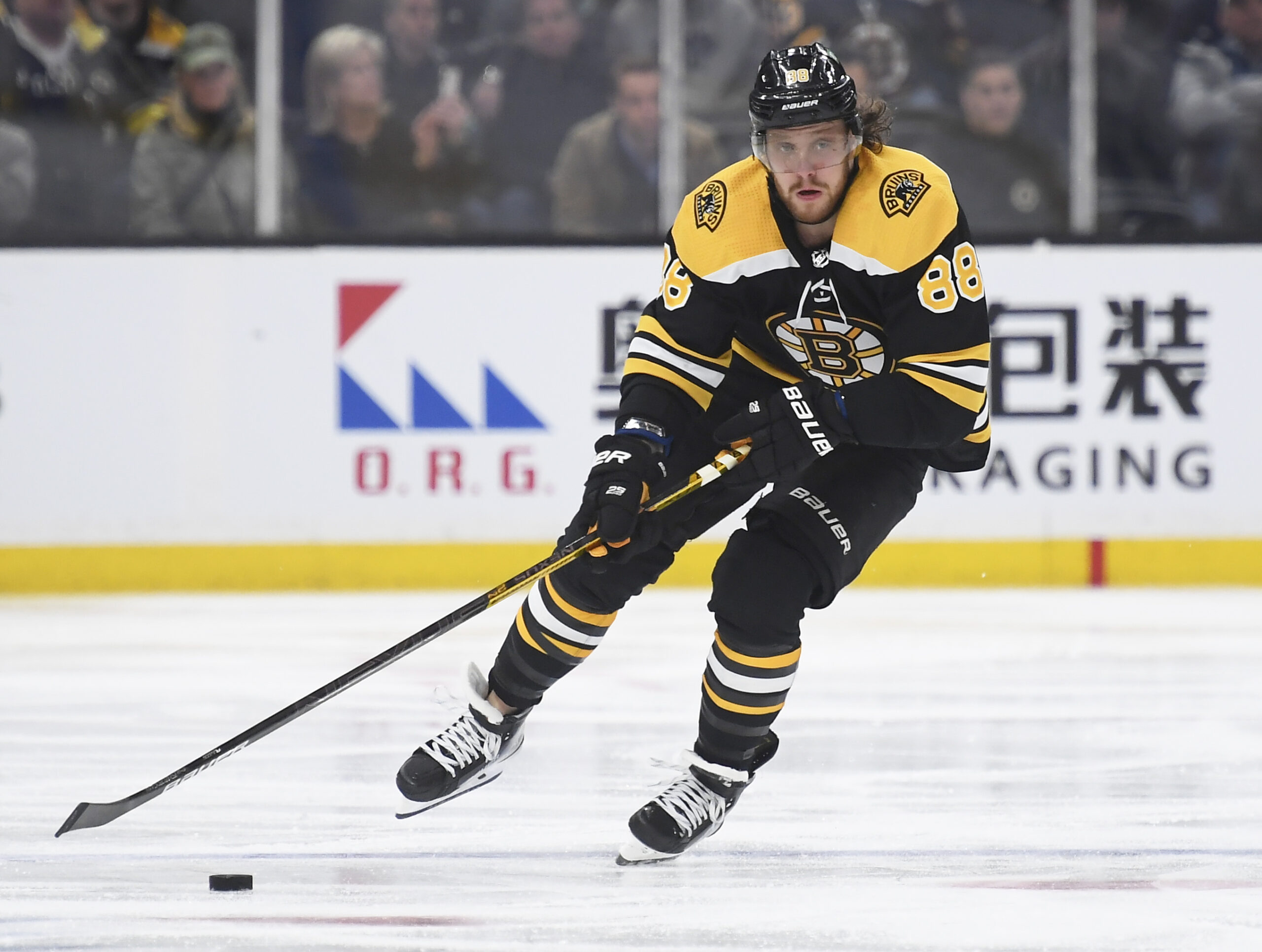 Mar 24, 2022; Boston, Massachusetts, USA; Boston Bruins right wing David Pastrnak (88) skates with the puck during the third period against the Tampa Bay Lightning at TD Garden. Mandatory Credit: Bob DeChiara-USA TODAY Sports