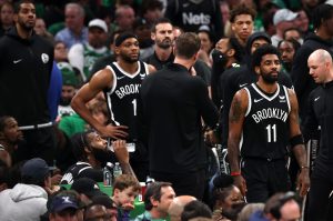 BOSTON, MASSACHUSETTS - APRIL 20: Kyrie Irving #11 of the Brooklyn Nets looks on during a timeout during the first quarter of Game Two of the Eastern Conference First Round NBA Playoffs against the Boston Celtics at TD Garden on April 20, 2022 in Boston, Massachusetts. (Photo by Maddie Meyer/Getty Images)