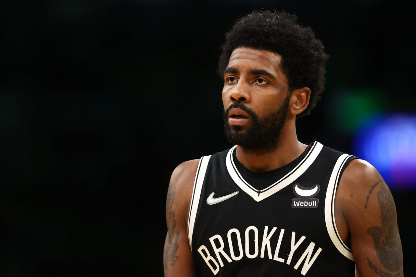 BOSTON, MASSACHUSETTS - APRIL 20: Kyrie Irving #11 of the Brooklyn Nets looks on during the second quarter of Game Two of the Eastern Conference First Round NBA Playoffs against the Boston Celtics at TD Garden on April 20, 2022 in Boston, Massachusetts. (Photo by Maddie Meyer/Getty Images)