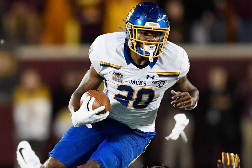 Pierre Strong Jr. #20 of the South Dakota State Jackrabbits avoids a tackles by Braelen Oliver #14 of the Minnesota Gophers during the fourth quarter of the game on August 29, 2018 at TCF Bank Stadium in Minneapolis, Minnesota. The Gophers defeated the Jackrabbits 28-21. (Photo by Hannah Foslien/Getty Images)