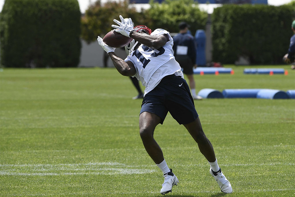 May 23, 2022; Foxborough, MA, USA; New England Patriots wide receiver Nelson Agholor (15) makes a catch at the team's OTA at Gillette Stadium. Mandatory Credit: Eric Canha-USA TODAY Sports