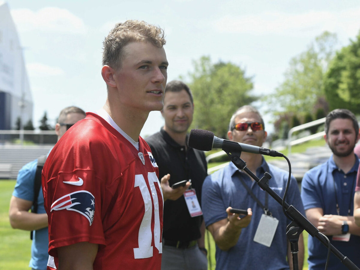 May 23, 2022; Foxborough, MA, USA; New England Patriots quarterback Mac Jones (10) heads to the practice field for the team's OTA at Gillette Stadium. Credit: Eric Canha-USA TODAY Sports