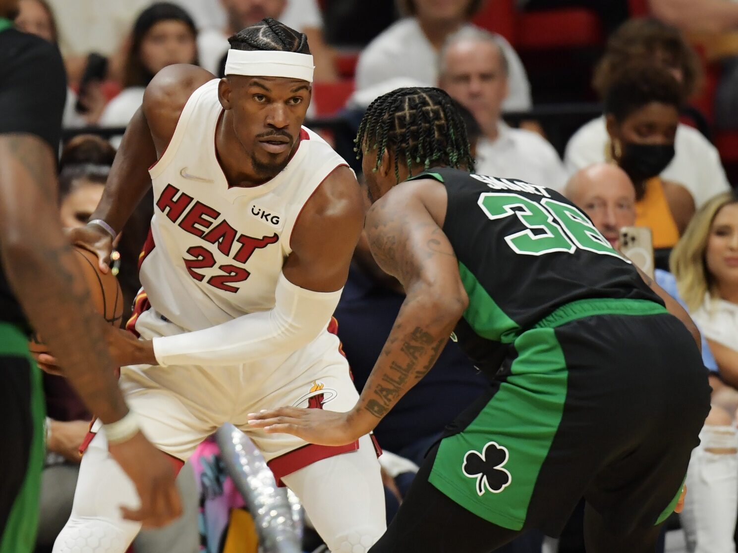 May 25, 2022; Miami, Florida, USA; Boston Celtics guard Marcus Smart (36) defends Miami Heat forward Jimmy Butler (22) the first half of game five of the 2022 eastern conference finals at FTX Arena. Credit: Jim Rassol-USA TODAY Sports