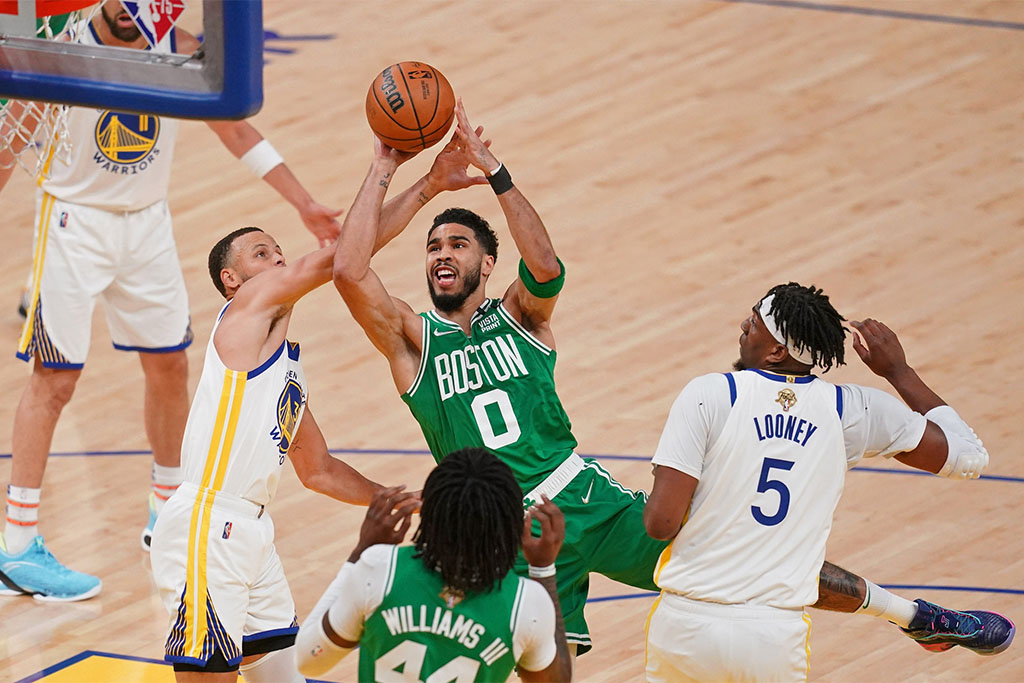 Jun 2, 2022; San Francisco, California, USA; Boston Celtics forward Jayson Tatum (0) shoots the ball while defended by Golden State Warriors guard Stephen Curry (left) during the first half of game one of the 2022 NBA Finals at Chase Center. Mandatory Credit: Cary Edmondson-USA TODAY Sports