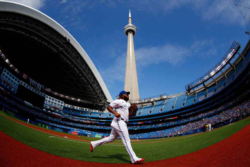 TORONTO, ON - SEPTEMBER 04: Vladimir Guerrero Jr. #27 of the Toronto Blue Jays runs to the dugout prior to a MLB game against the Oakland Athletics at Rogers Centre on September 4, 2021 in Toronto, Ontario, Canada. (Photo by Vaughn Ridley/Getty Images)