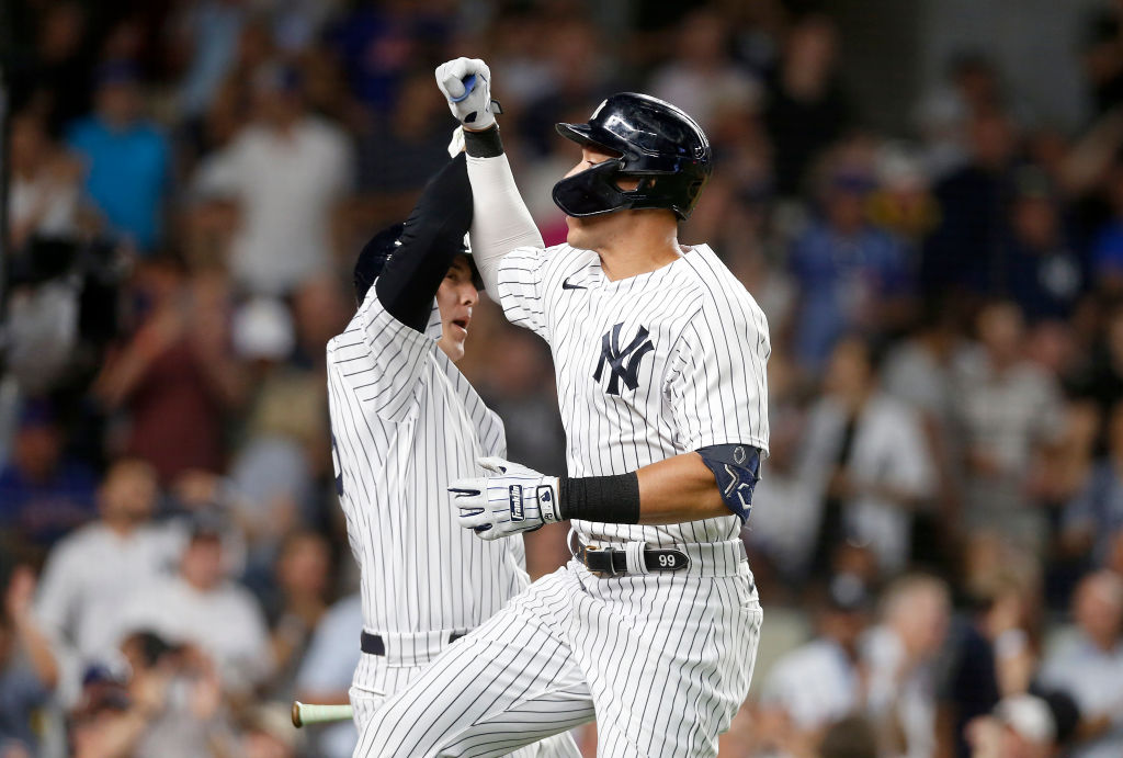 NEW YORK, NEW YORK - AUGUST 23: Aaron Judge #99 of the New York Yankees celebrates his fourth inning home run against the New York Mets with teammate Anthony Rizzo #48 at Yankee Stadium on August 23, 2022 in New York City. (Photo by Jim McIsaac/Getty Images)