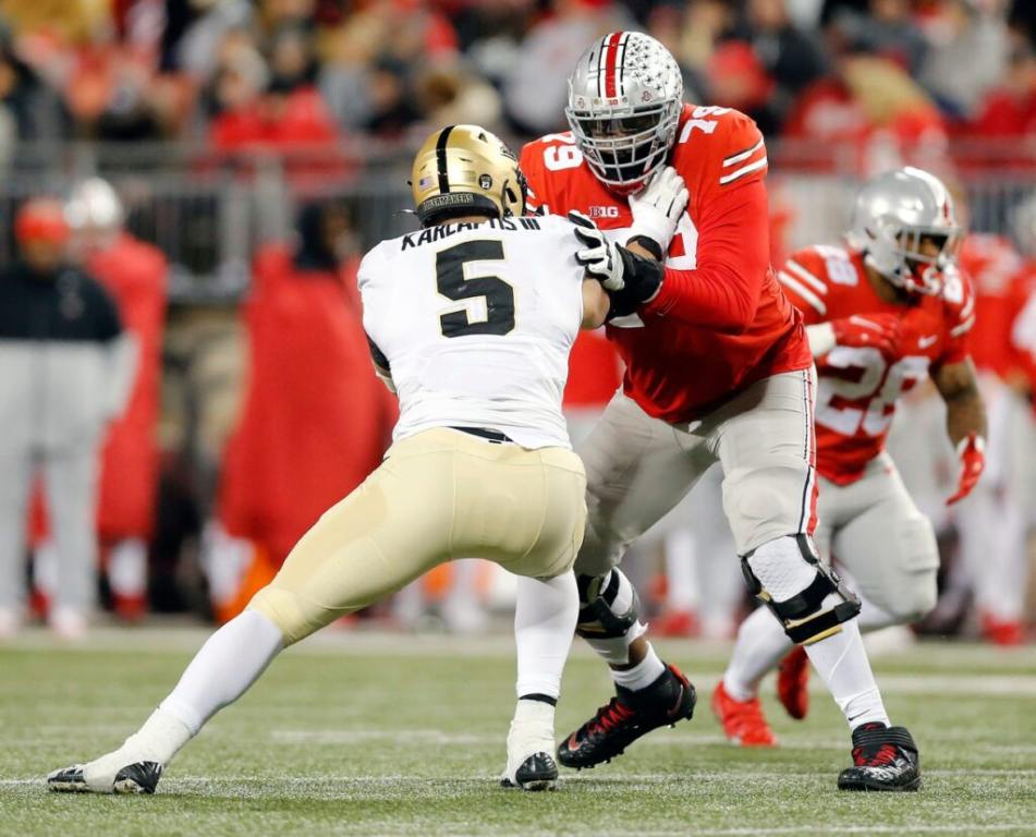 Ohio State Buckeyes offensive lineman Dawand Jones (79) blocks Purdue Boilermakers defensive end George Karlaftis (5) during the 4th quarter of their NCAA game at Ohio Stadium in Columbus, Ohio on November 13, 2021. (Kyle Robertson/Columbus Dispatch/USA TODAY Network)