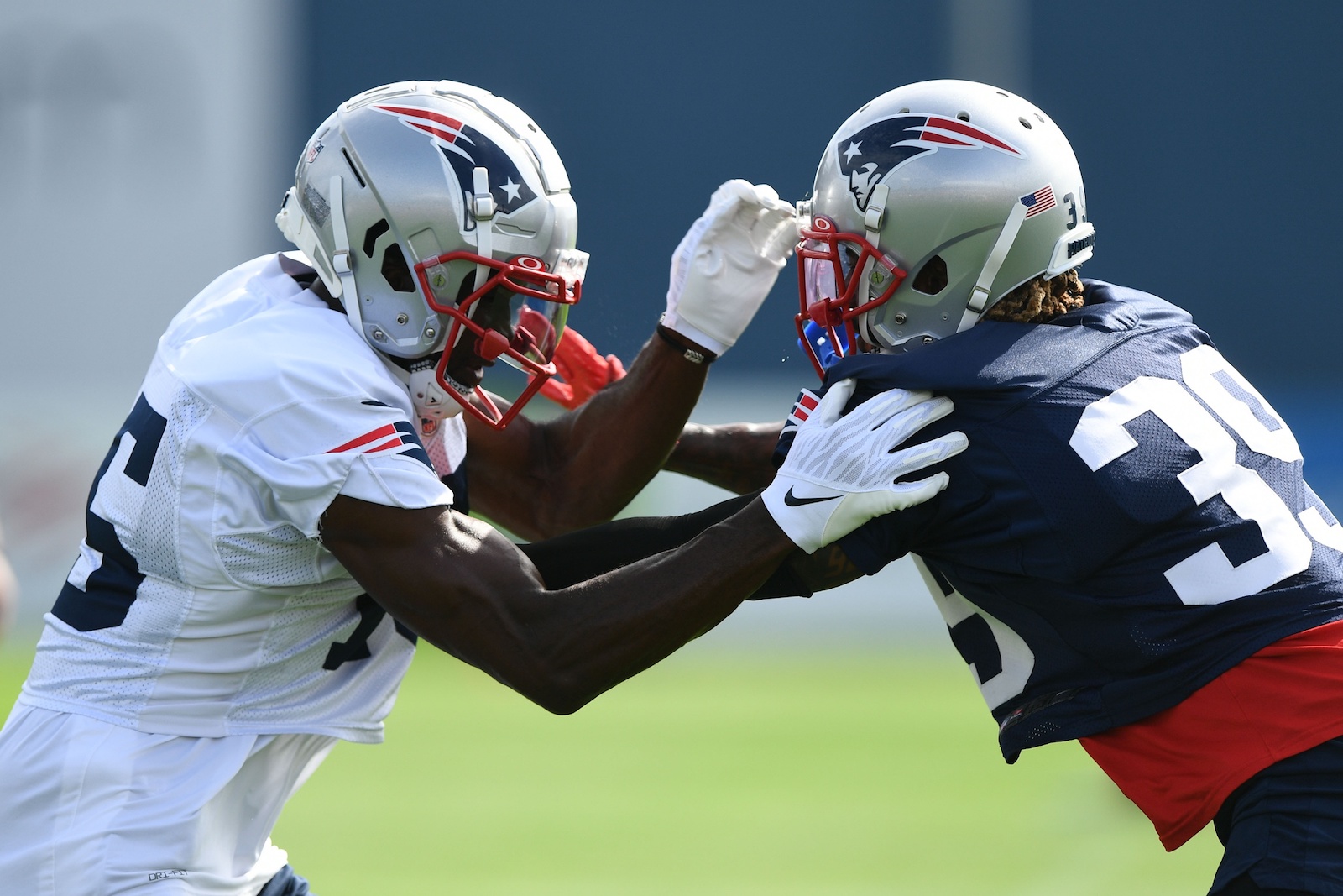 Jul 29, 2022; Foxborough, MA, USA; New England Patriots wide receiver Nelson Agholor (15) and defensive back Terrance Mitchell (39) run a drill during training camp at Gillette Stadium. Mandatory Credit: Brian Fluharty/USA TODAY Sports
