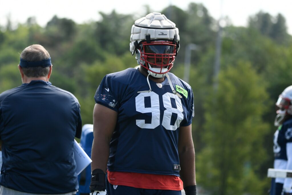 Jul 30, 2022; Foxborough, MA, USA; New England Patriots defensive tackle Carl Davis Jr (98) works out at the Patriots training camp at Gillette Stadium. Credit: Eric Canha-USA TODAY Sports