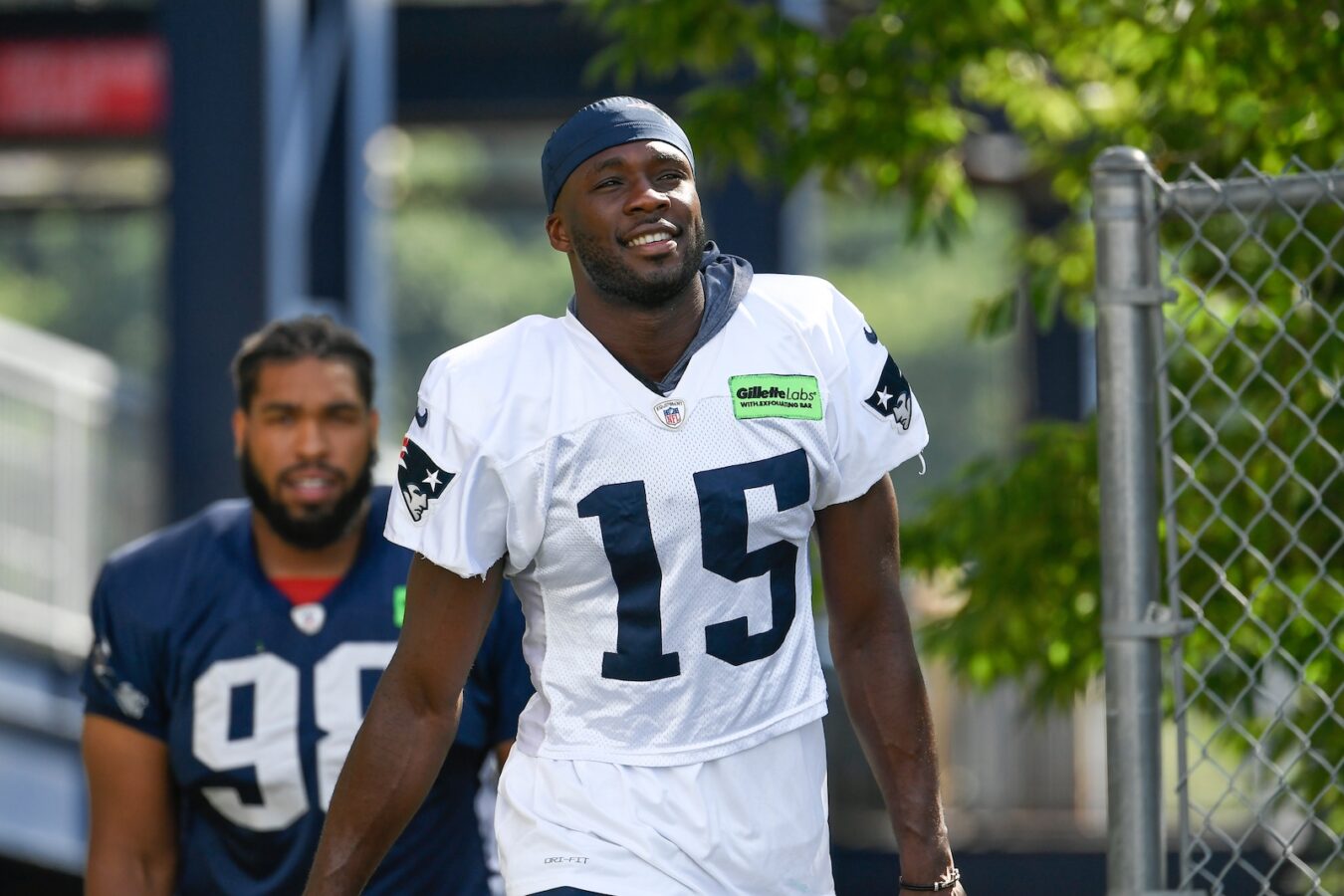 Jul 30, 2022; Foxborough, MA, USA; New England Patriots wide receiver Nelson Agholor (15) walks to the practice field at the Patriots training camp at Gillette Stadium. Mandatory Credit: Eric Canha/USA TODAY Sports