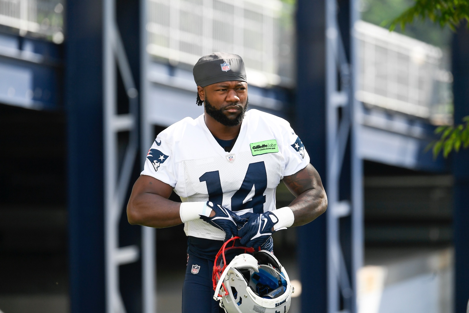 Jul 30, 2022; Foxborough, MA, USA; New England Patriots wide receiver Ty Montgomery (14) walks to the practice field at the Patriots training camp at Gillette Stadium. Mandatory Credit: Eric Canha/USA TODAY Sports